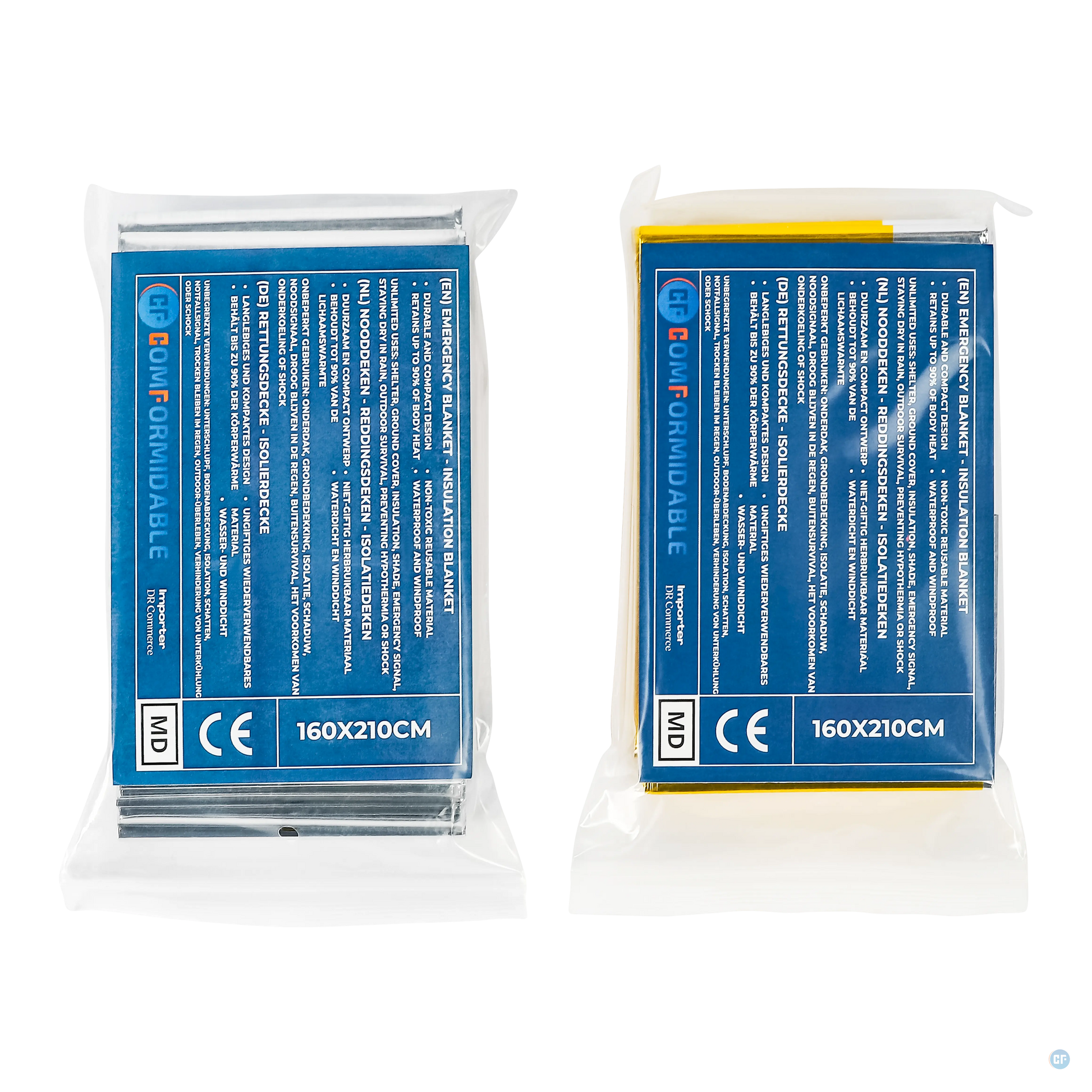 Twee verpakte Comformidable Emergency Blankets met blauw etiket, voorzien van productinformatie in meerdere talen. Links een zilverkleurige nooddeken en rechts een goudkleurige nooddeken, beide in een doorzichtige plastic verpakking. Afmetingen: 160x210 cm.